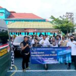 Divisi Pemasyarakatan Kemenkumham Gorontalo Berbagi dengan Warga Desa Poduwoma