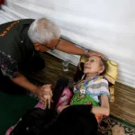 Pj Gubernur Gorontalo Pantau Kesehatan Pengungsi di Aula Rumah Dinas Walikota Gorontalo